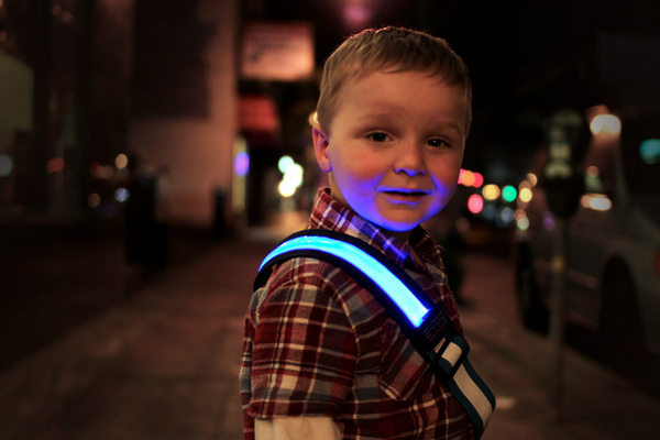 A young boy wearing Halo Belt 2.0.
