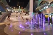 Playful interactive lighting to the fountain in the plaza changes color at regular durations.