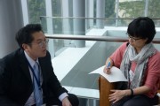 Dr. Yao Chiu-Lin, Deputy Director in Marketing Center of Epistar (left) is interviewed after his presentation. (LEDinside)